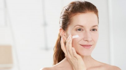 Bioderma - woman applying cream on the face