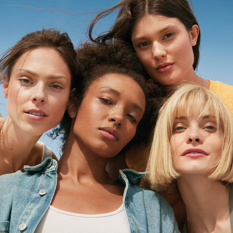 Quatro mulheres à luz do sol, protegidas por FPS