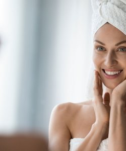 Woman touching her soft skin